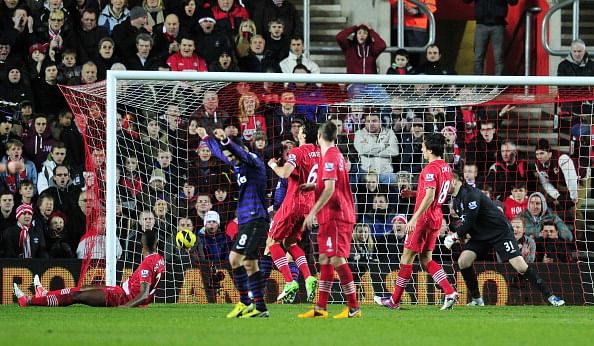 Southampton's Brazilian striker Guly Do Prado (L) deflects the ball into his own net for Arsenal's equalizer